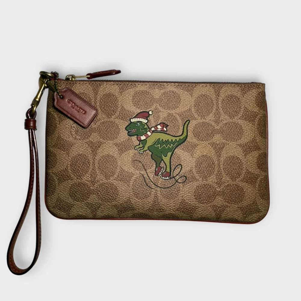 EUC Coach Holiday Rexy Ski Signature Brown Wristlet with Green Dinosaur Design - Picture 2 of 7